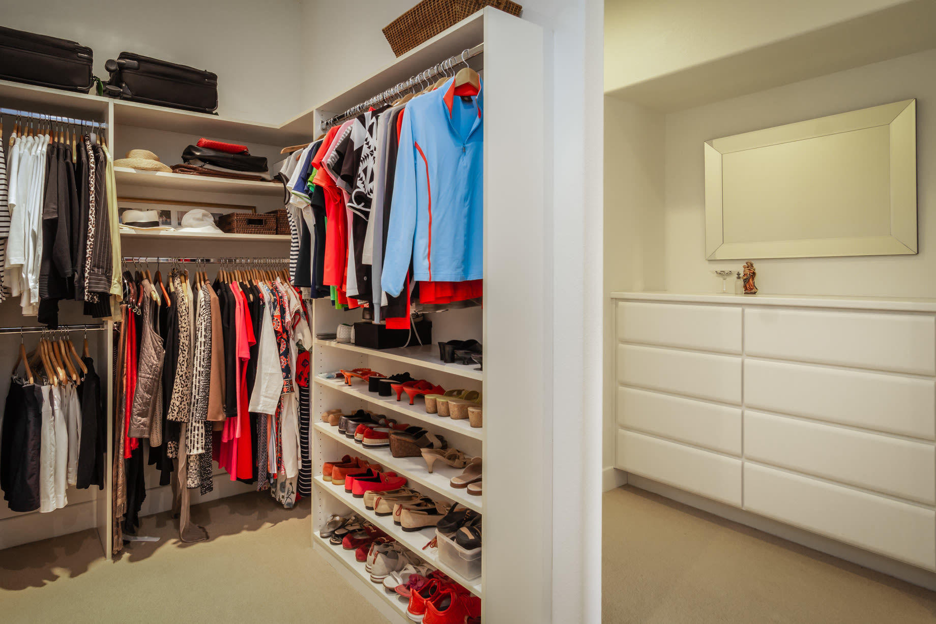238 Loch Lomond Road Rancho Mirage, CA 92270 - Photo 26 of 44 a view of walk in closet with clothes and shoes
