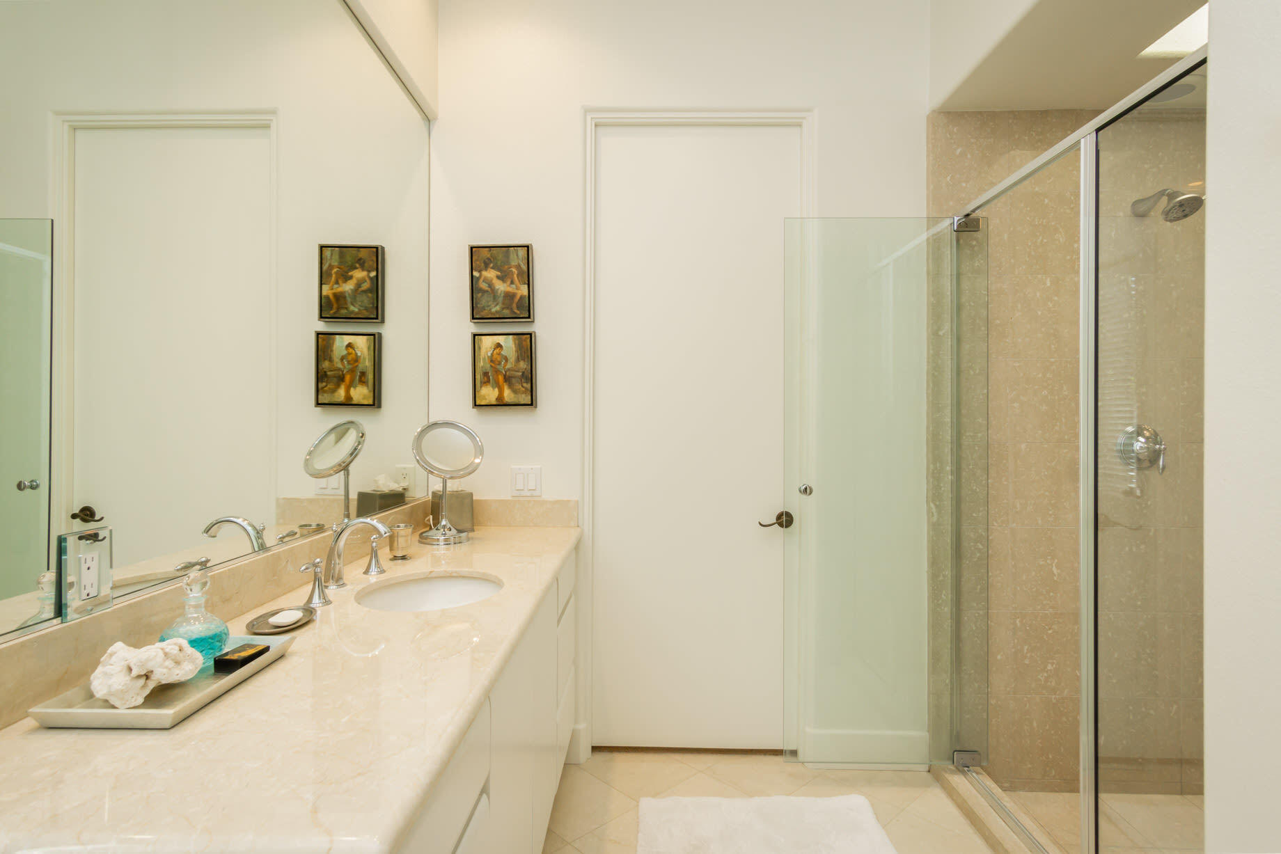 238 Loch Lomond Road Rancho Mirage, CA 92270 - Photo 28 of 44 a bathroom with a double vanity sink and a mirror