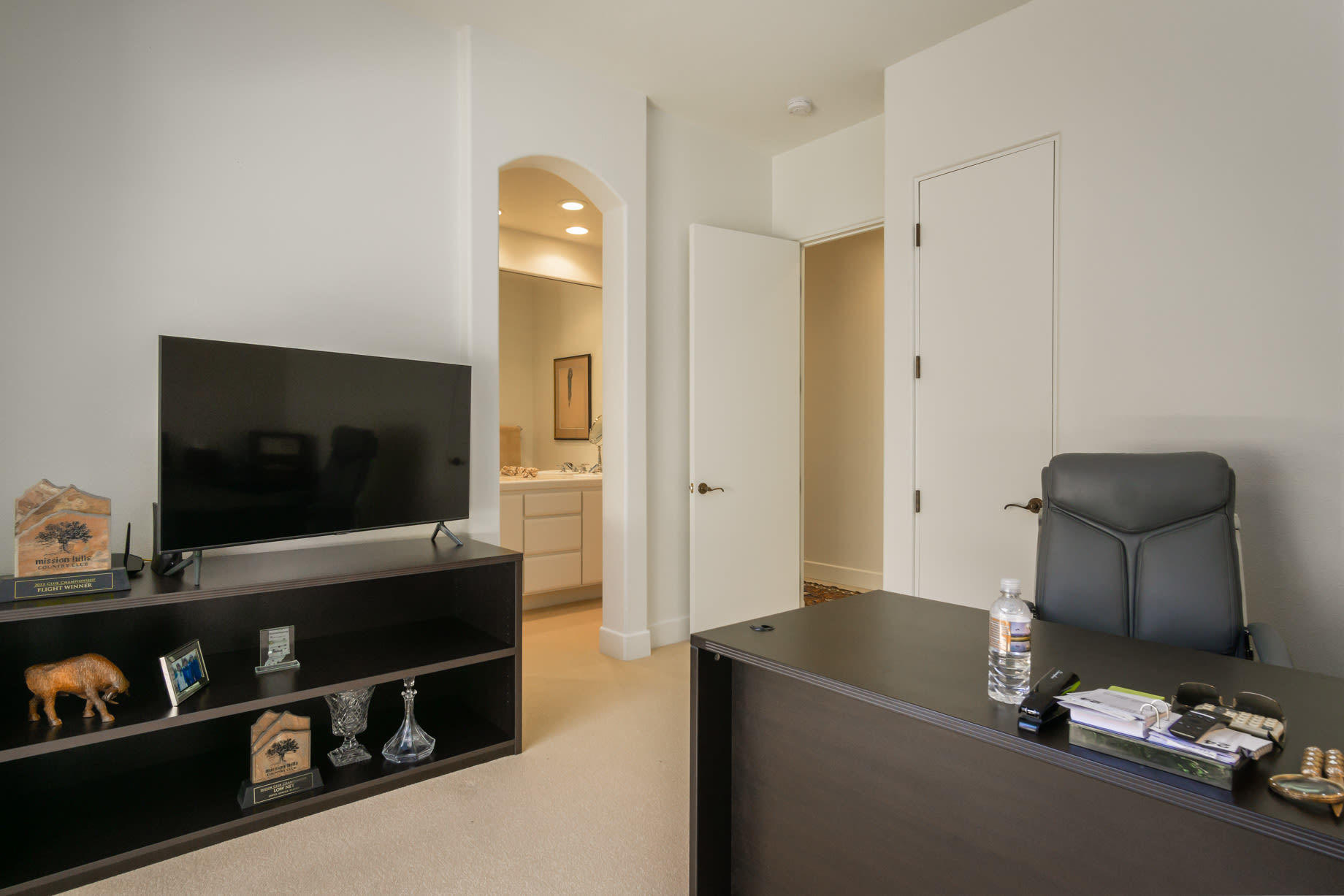 238 Loch Lomond Road Rancho Mirage, CA 92270 - Photo 35 of 44 a living room with furniture and a flat screen tv