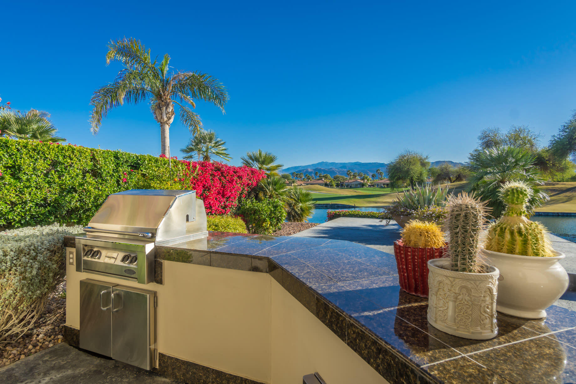 238 Loch Lomond Road Rancho Mirage, CA 92270 - Photo 41 of 44 a view of a outdoor space with a patio