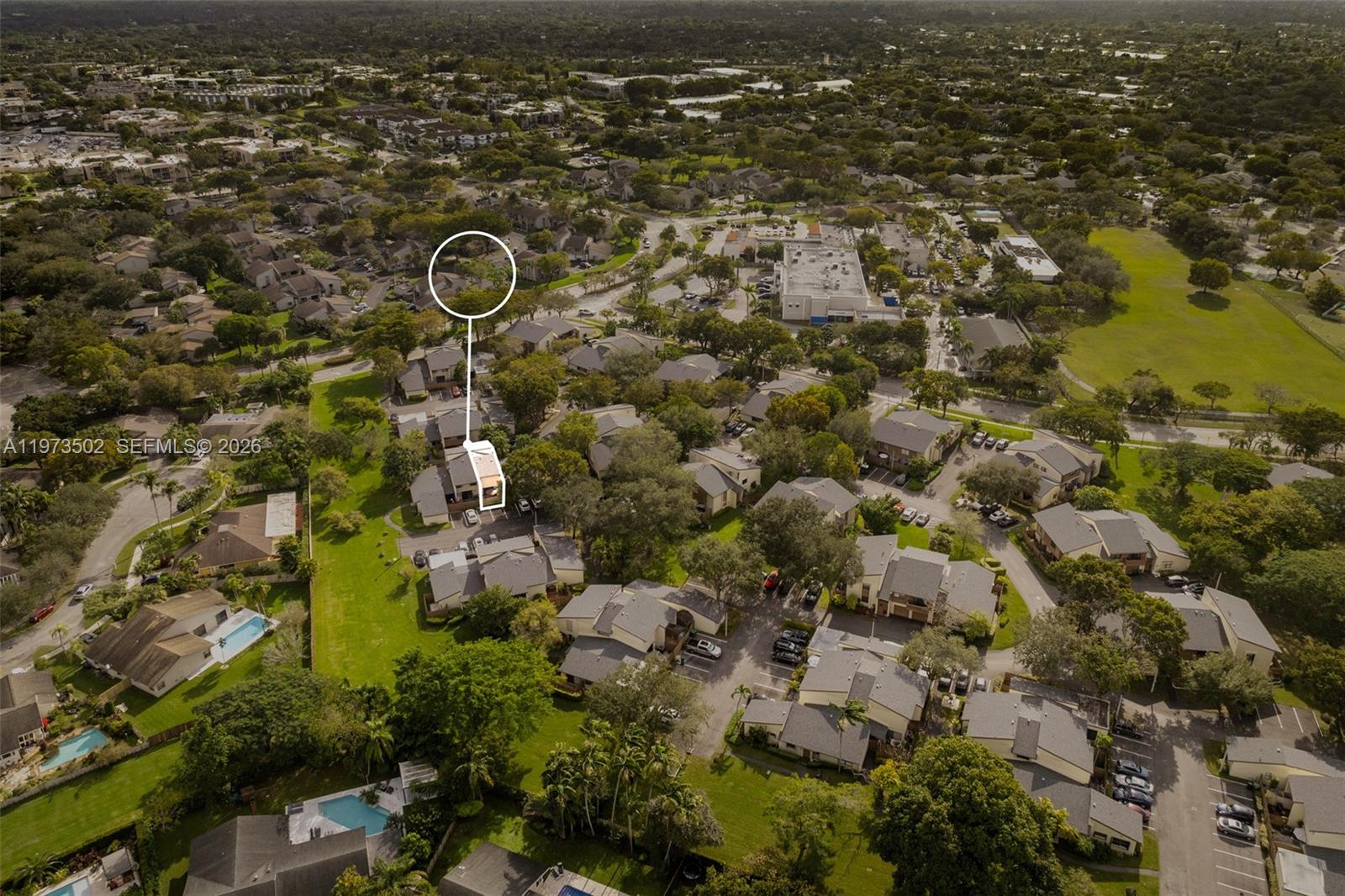 11353 Southwest 109th Road, Unit 55X Miami, FL 33176 - Photo 24 of 26 an aerial view of a residential houses with yard
