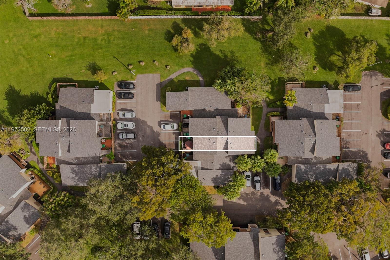 11353 Southwest 109th Road, Unit 55X Miami, FL 33176 - Photo 25 of 26 an aerial view of a house with a yard and lake view