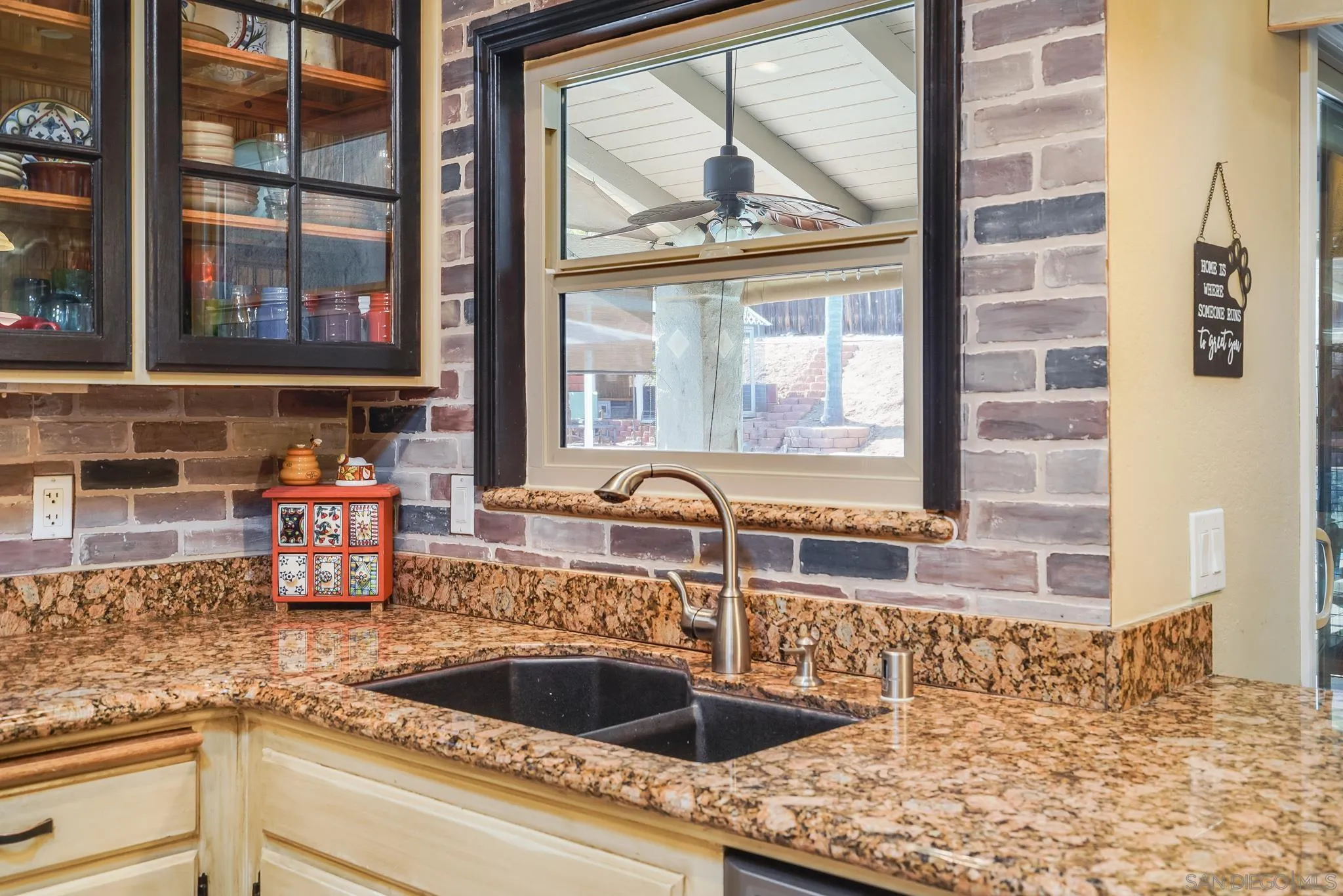 3764 Avocado Boulevard La Mesa, CA 91941 - Photo 19 of 66 a kitchen with a sink and a large window