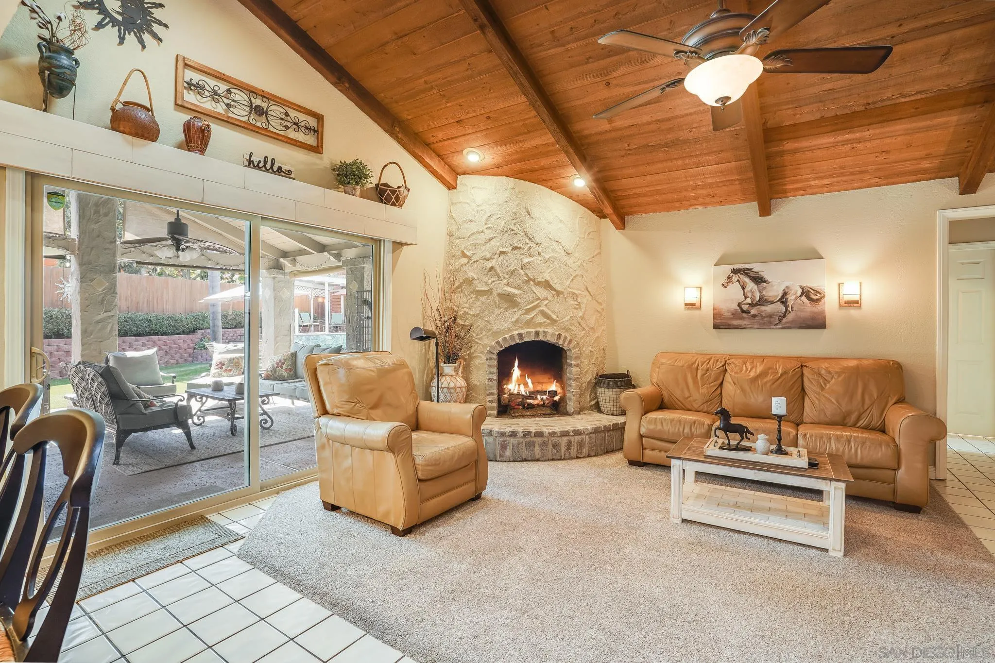 3764 Avocado Boulevard La Mesa, CA 91941 - Photo 23 of 66 a living room with furniture and a fireplace