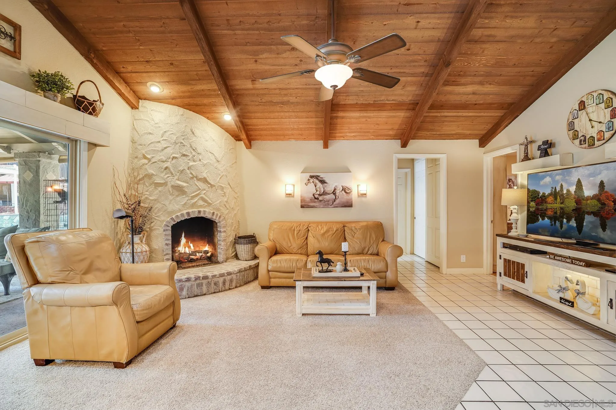3764 Avocado Boulevard La Mesa, CA 91941 - Photo 24 of 66 a living room with furniture and a fireplace