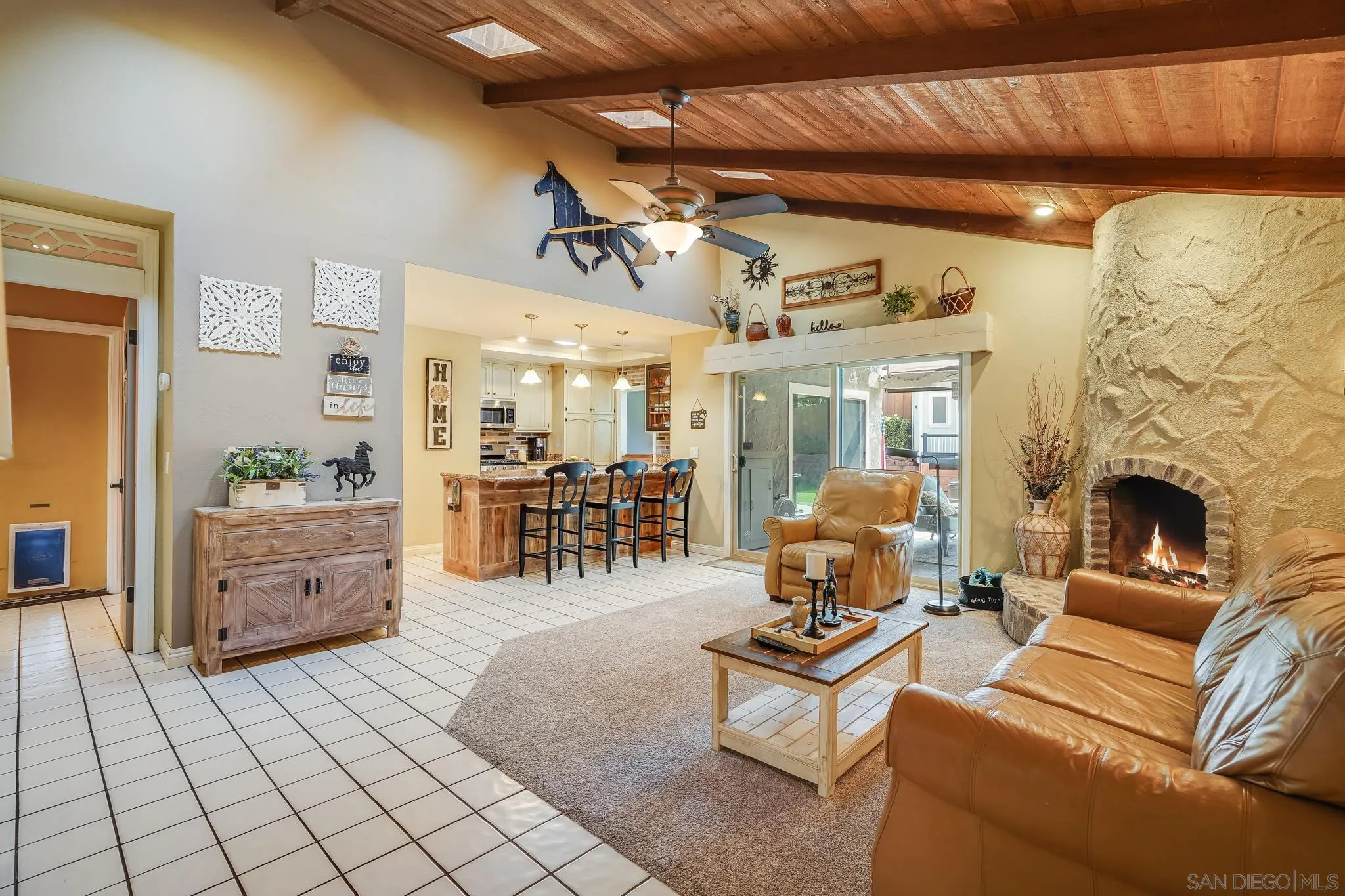 3764 Avocado Boulevard La Mesa, CA 91941 - Photo 26 of 66 a living room with furniture and a fireplace