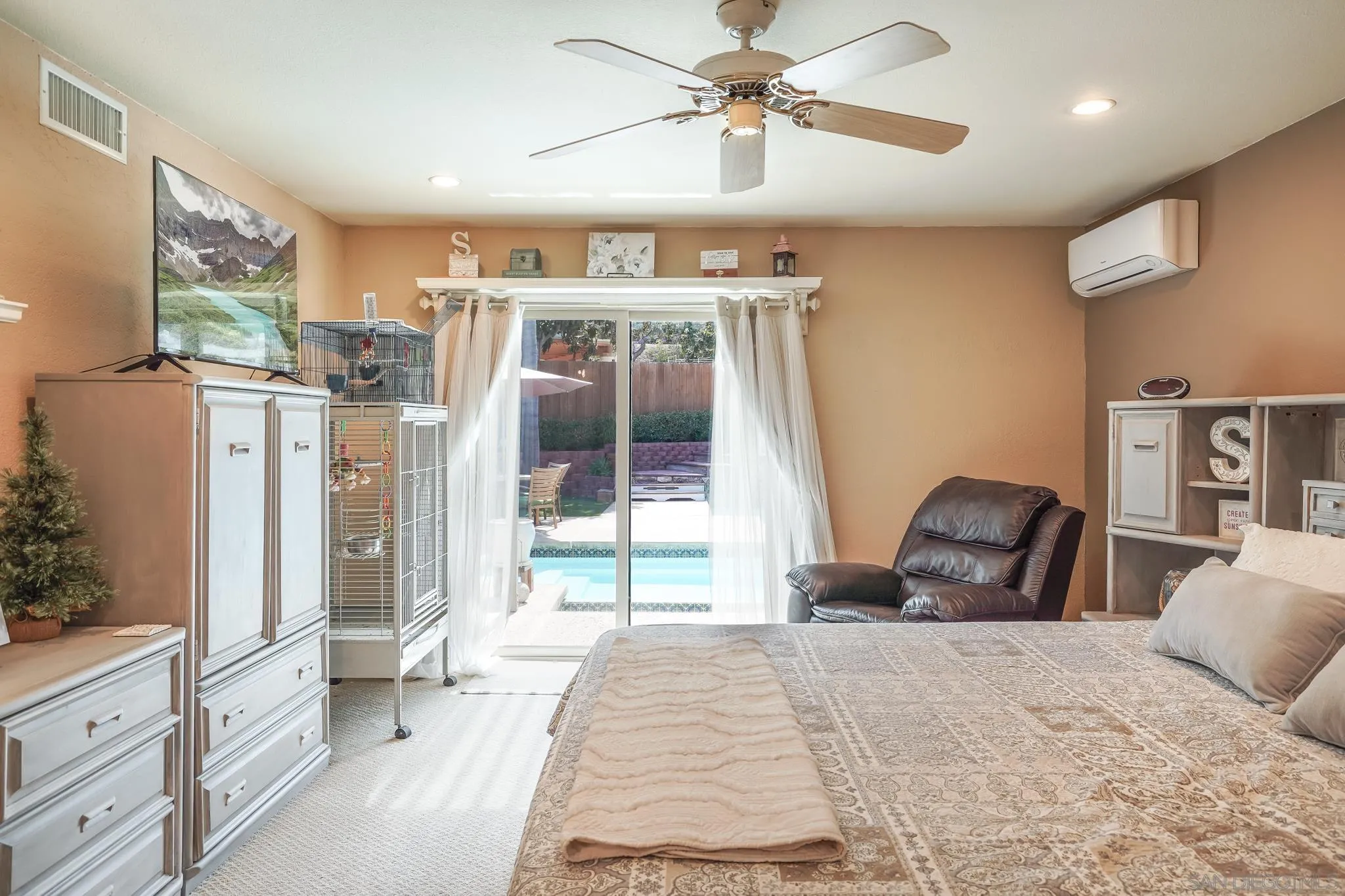 3764 Avocado Boulevard La Mesa, CA 91941 - Photo 38 of 66 a bedroom with a bed and a large window