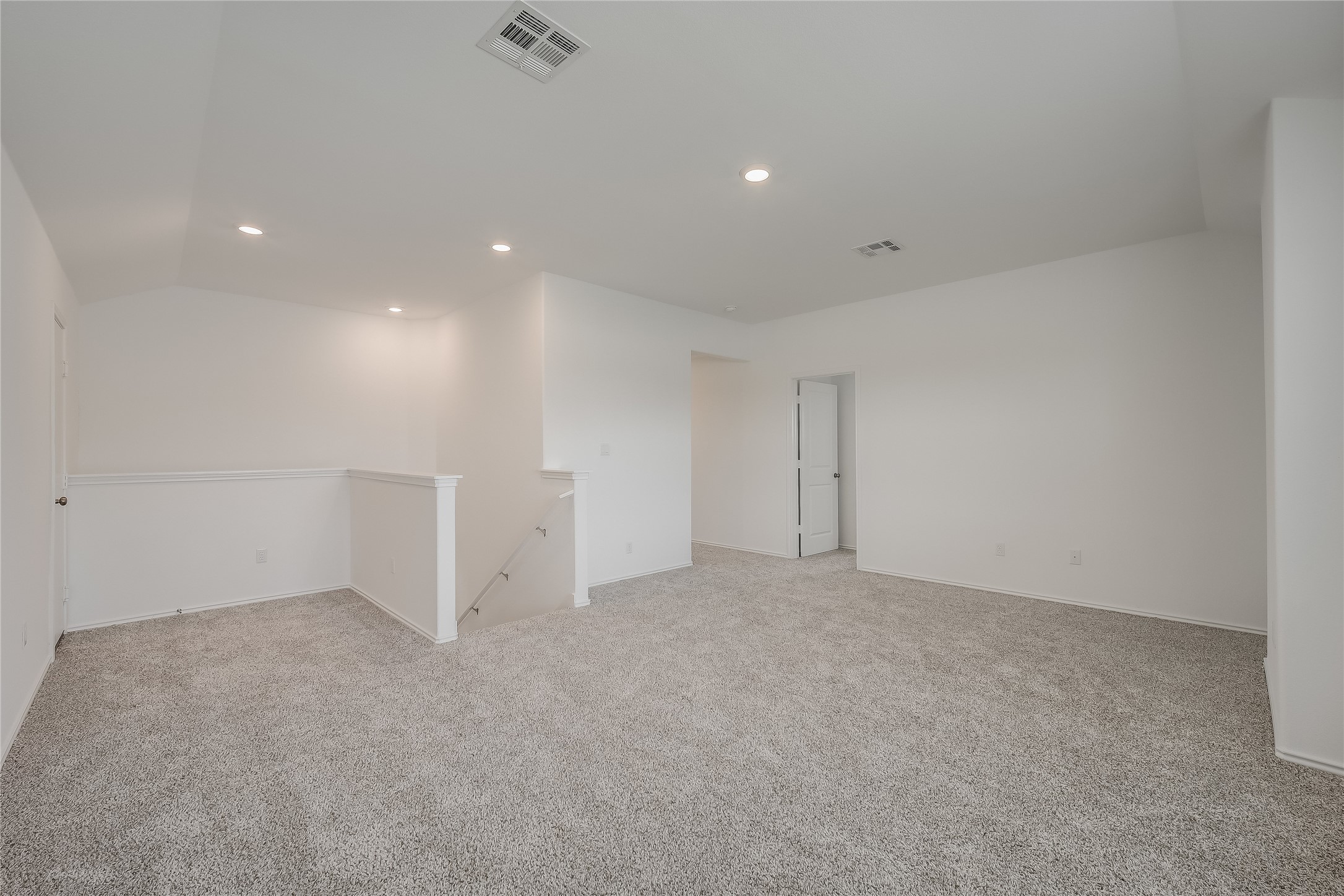 932 Mallow Road Leander, TX 78641 - Photo 14 of 40 Spacious room featuring light-colored carpet flooring, recessed lighting, and white walls