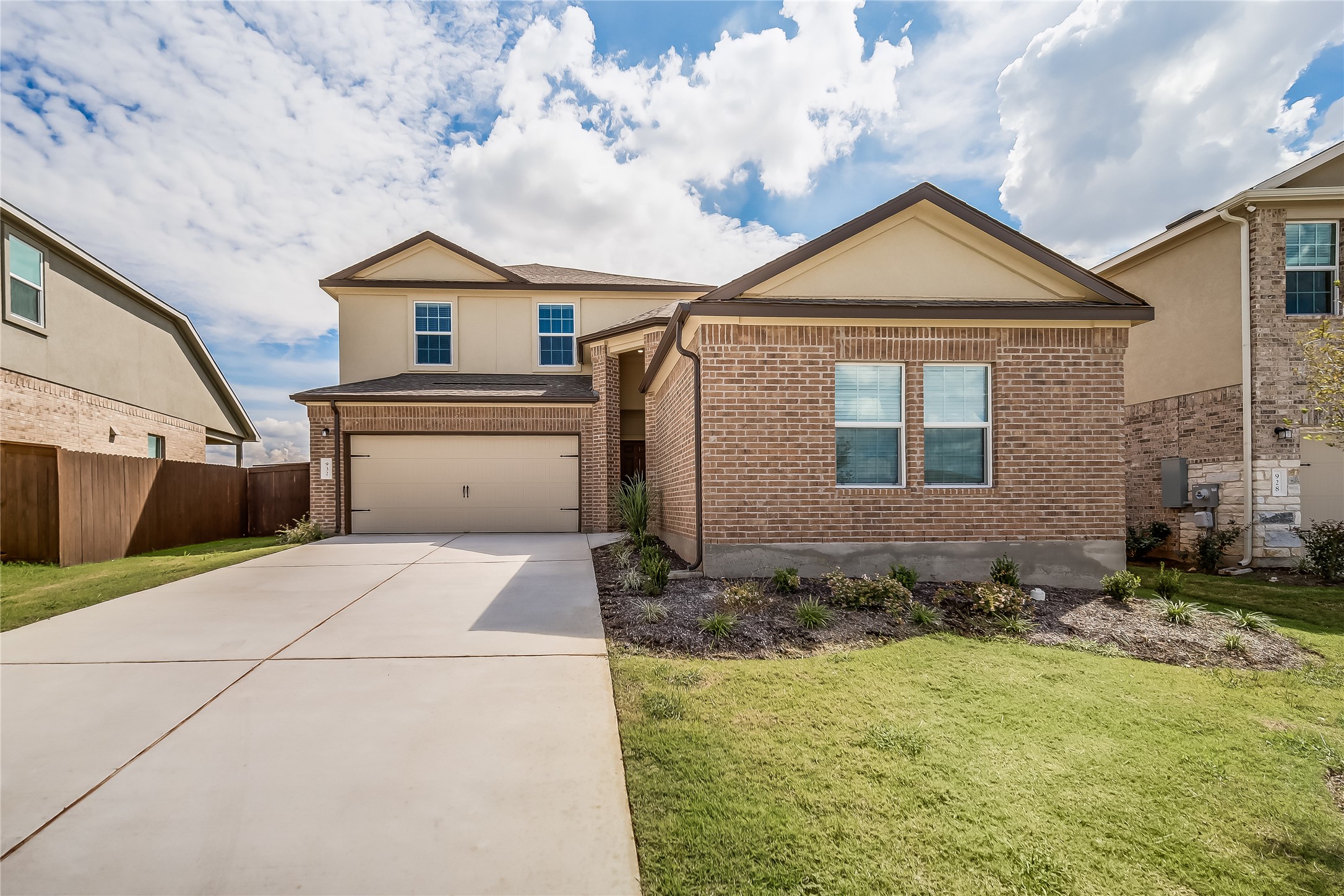 932 Mallow Road Leander, TX 78641 - Photo 2 of 40 a front view of a house with a yard
