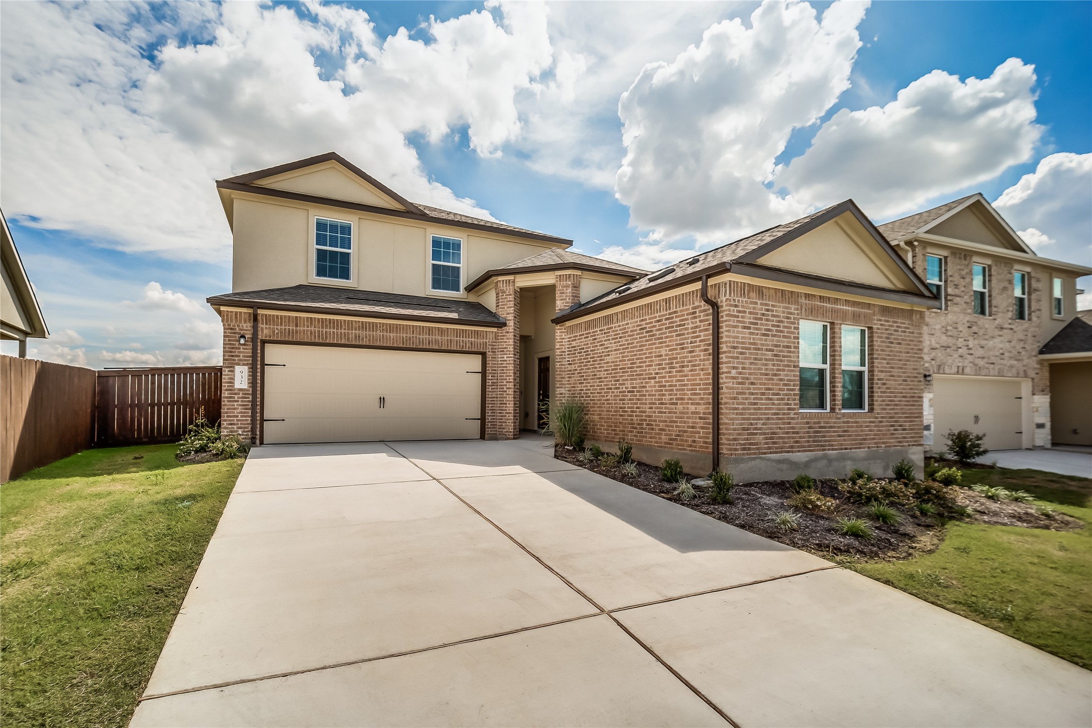 932 Mallow Road Leander, TX 78641 - Photo 3 of 40 a front view of a house with a yard
