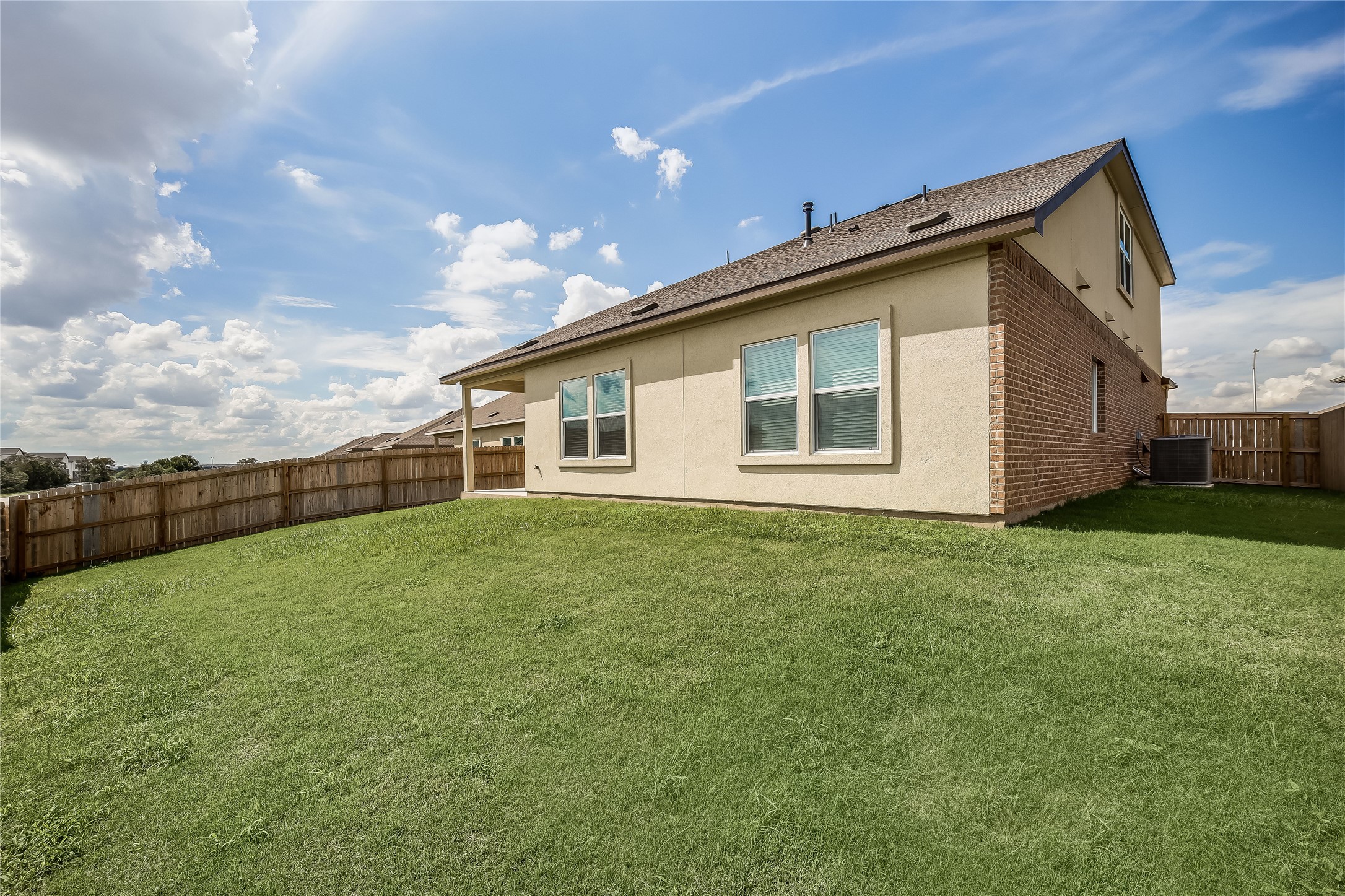 932 Mallow Road Leander, TX 78641 - Photo 32 of 40 a view of a backyard of the house