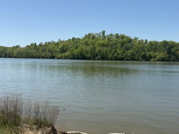 a view of lake with mountain