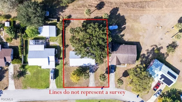 an aerial view of houses with outdoor space