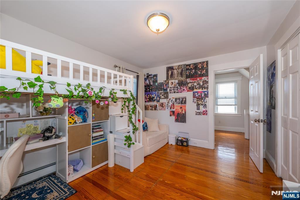 690 Garden Street Maywood, NJ 07607 - Photo 33 of 49 a room with furniture and a window