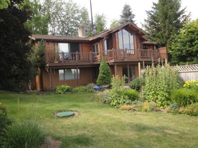 367 Gwinn Road Dayton, WA 99328 - Photo 1 of 1 a front view of a house with a garden