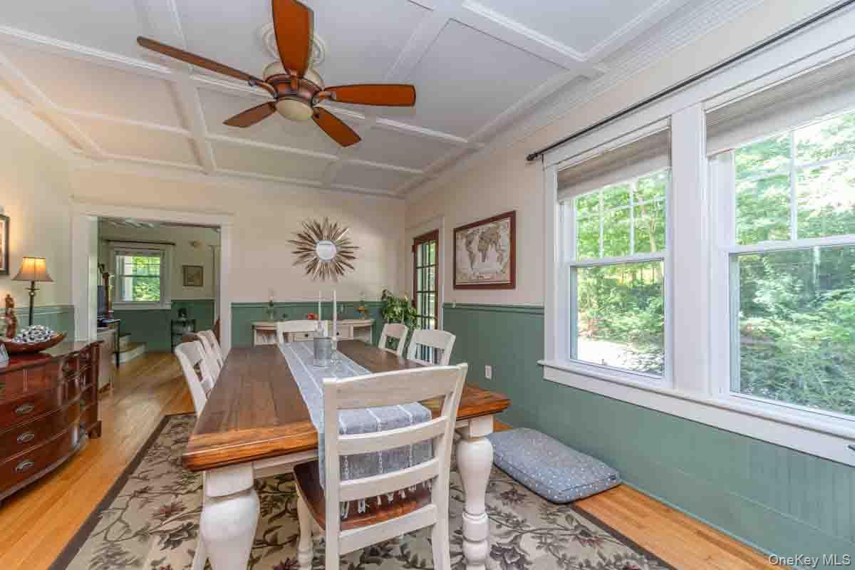 145 Drake Road Pleasant Valley, NY 12569 - Photo 16 of 47 Coffered ceiling with a ceiling fan, hardwood flooring, and white trim double-hung windows