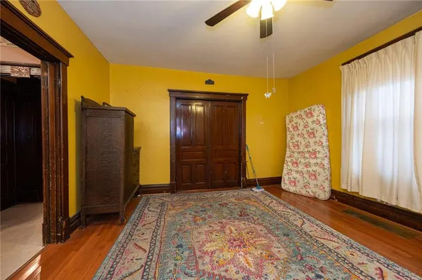 a view of a bedroom with closet area