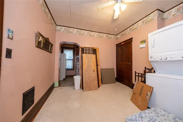 a kitchen with a sink a stove and a refrigerator
