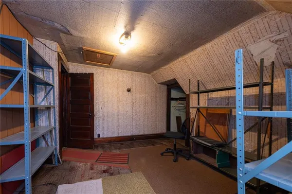 a view of entryway with wooden floor