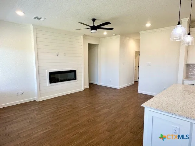 a view of a livingroom with a fireplace