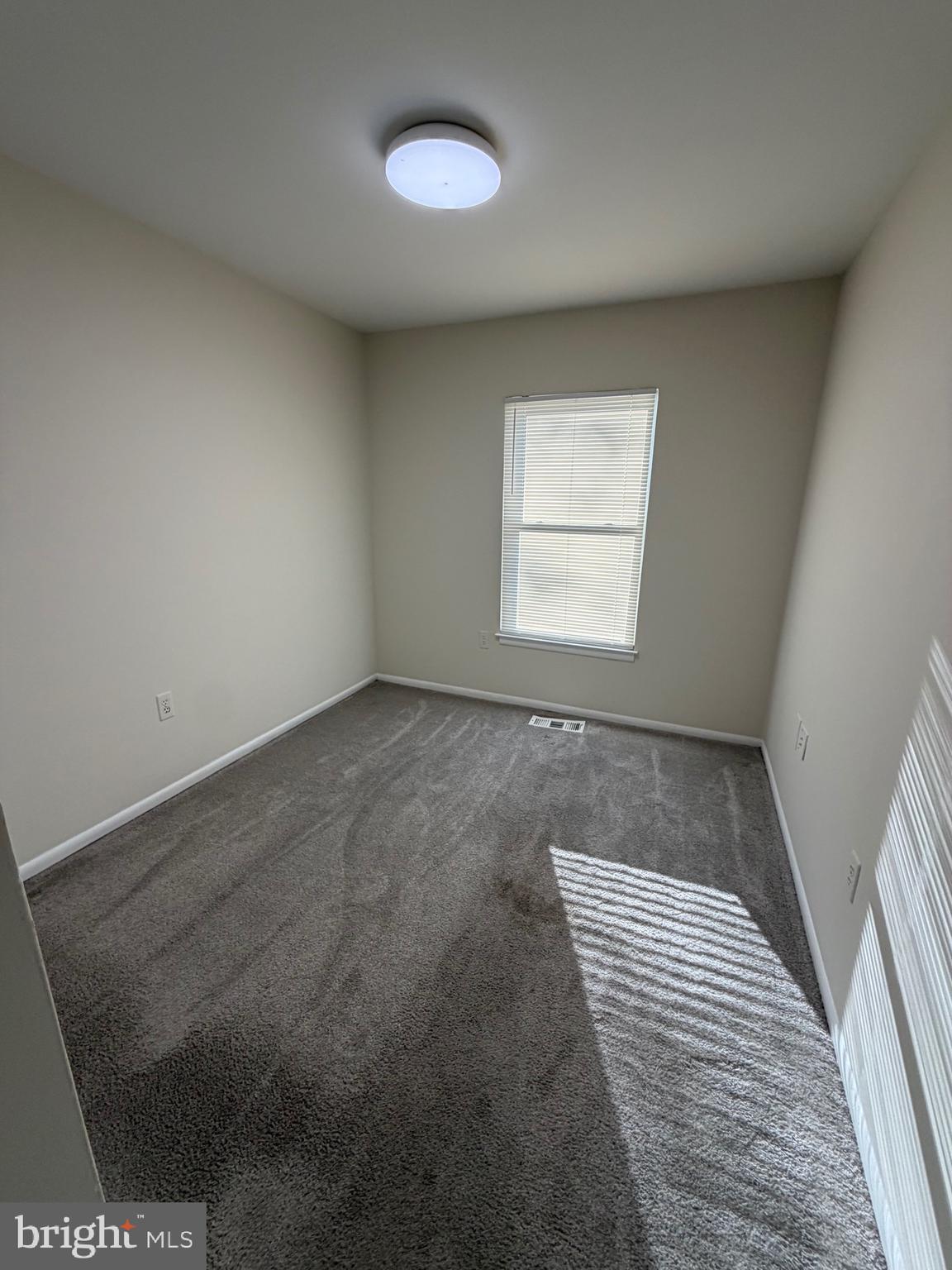 6427 Old Scotts Court Springfield, VA 22152 - Photo 13 of 27 an empty room with windows