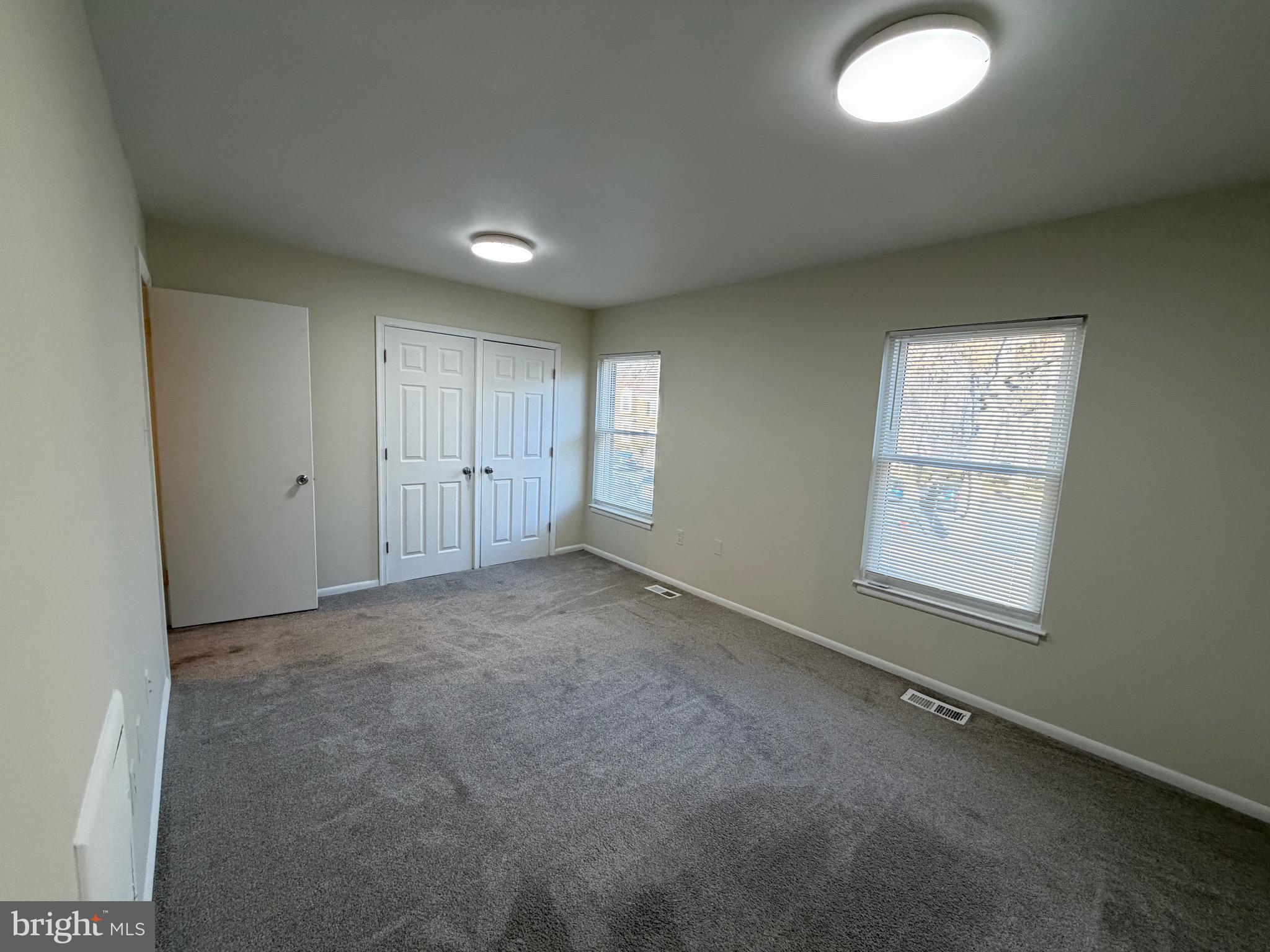 6427 Old Scotts Court Springfield, VA 22152 - Photo 15 of 27 an empty room with windows