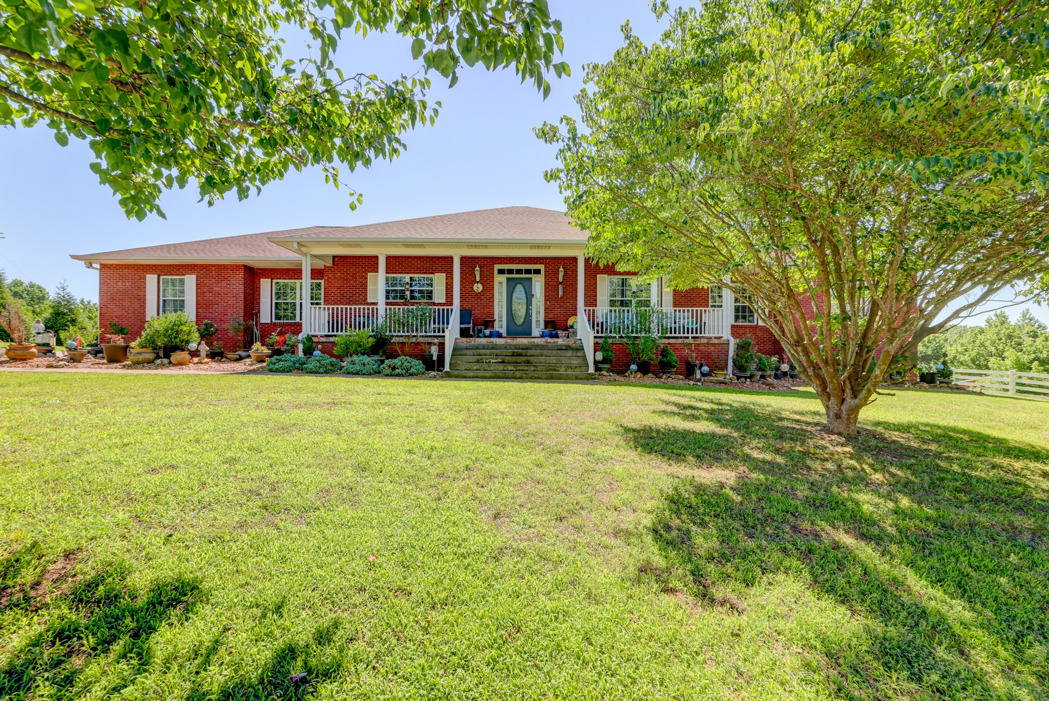 2251 Davidson Graveyard Road Clarksville, TN 37043 - Photo 1 of 78 a front view of a house with a yard