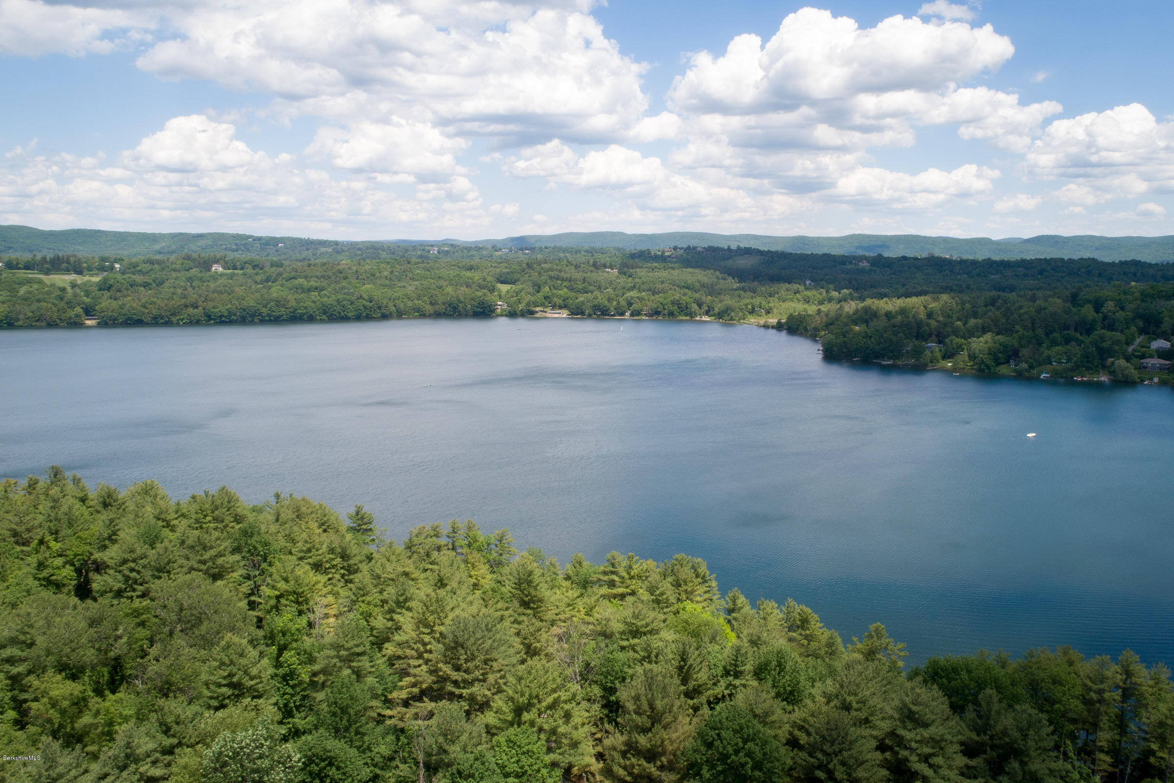 78 Interlaken Road Stockbridge, MA 01262 - Photo 3 of 36 an aerial view of a houses with a lake view