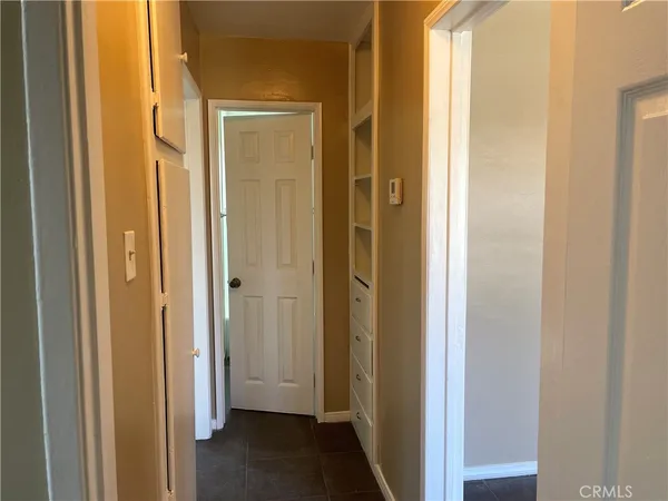 a view of a bathroom from a hallway