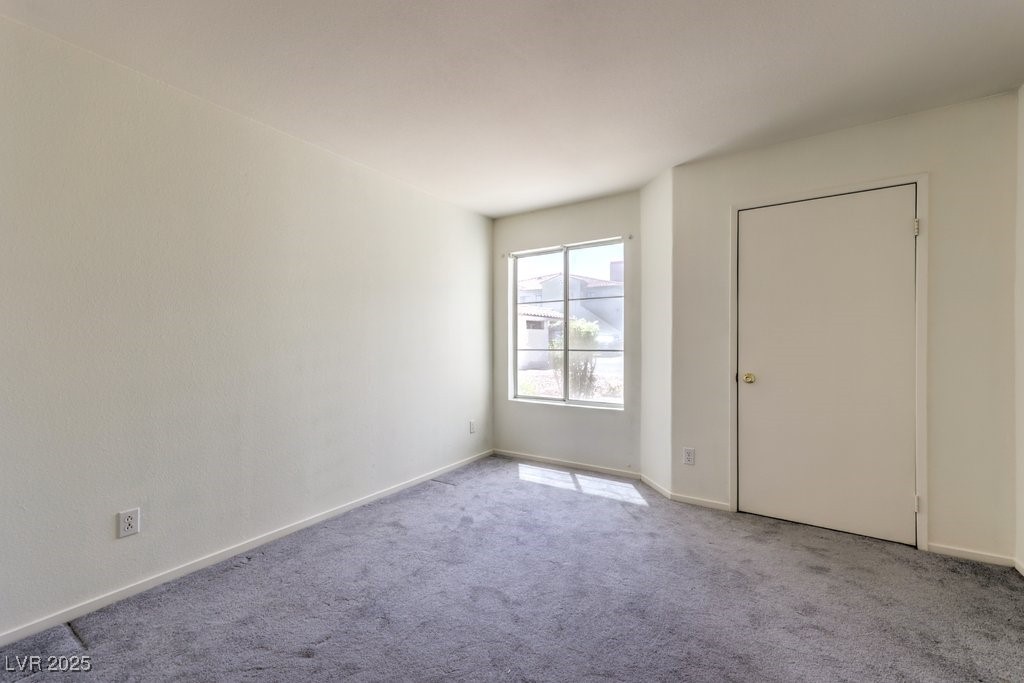 698 South Racetrack Road, Unit 1014 Henderson, NV 89015 - Photo 8 of 25 Spare room with carpet floors and baseboards
