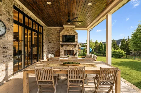 a outdoor living space with furniture and garden view