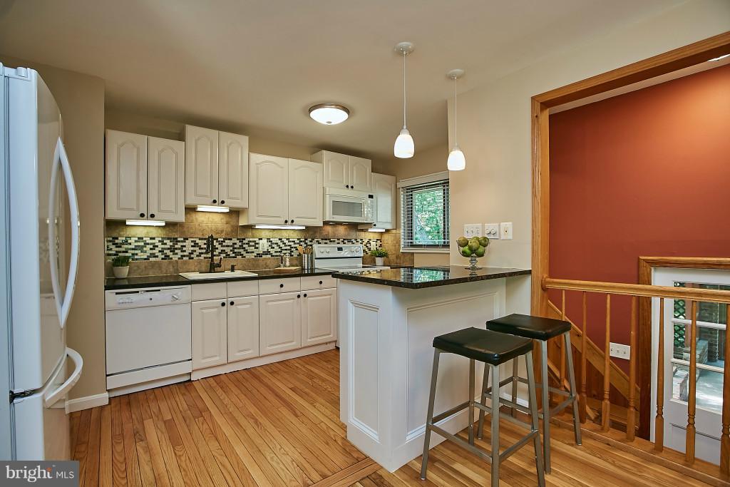 3910 Bryce Road Alexandria, VA 22312 - Photo 9 of 30 Kitchen is Open to DR&Additional Dining Space