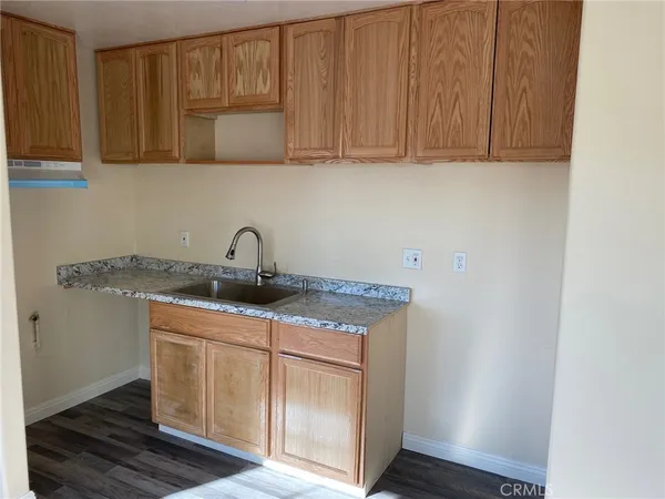 a utility room with cabinets