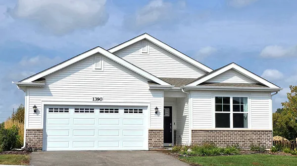 a view of house with garage