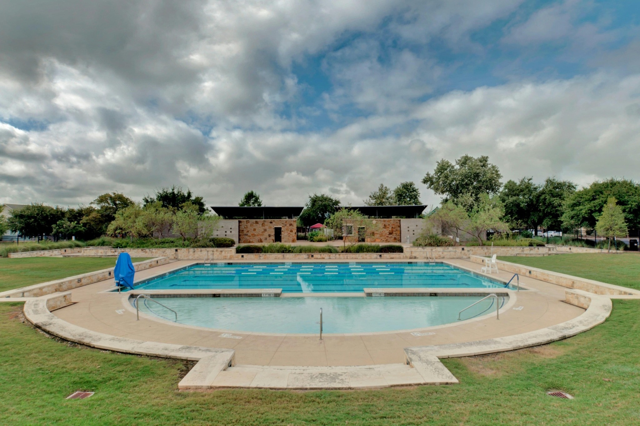 2133 Emma Long Street Austin, TX 78723 - Photo 29 of 39 Resort-style community pool provides the perfect spot to cool off and relax on warm Austin days.