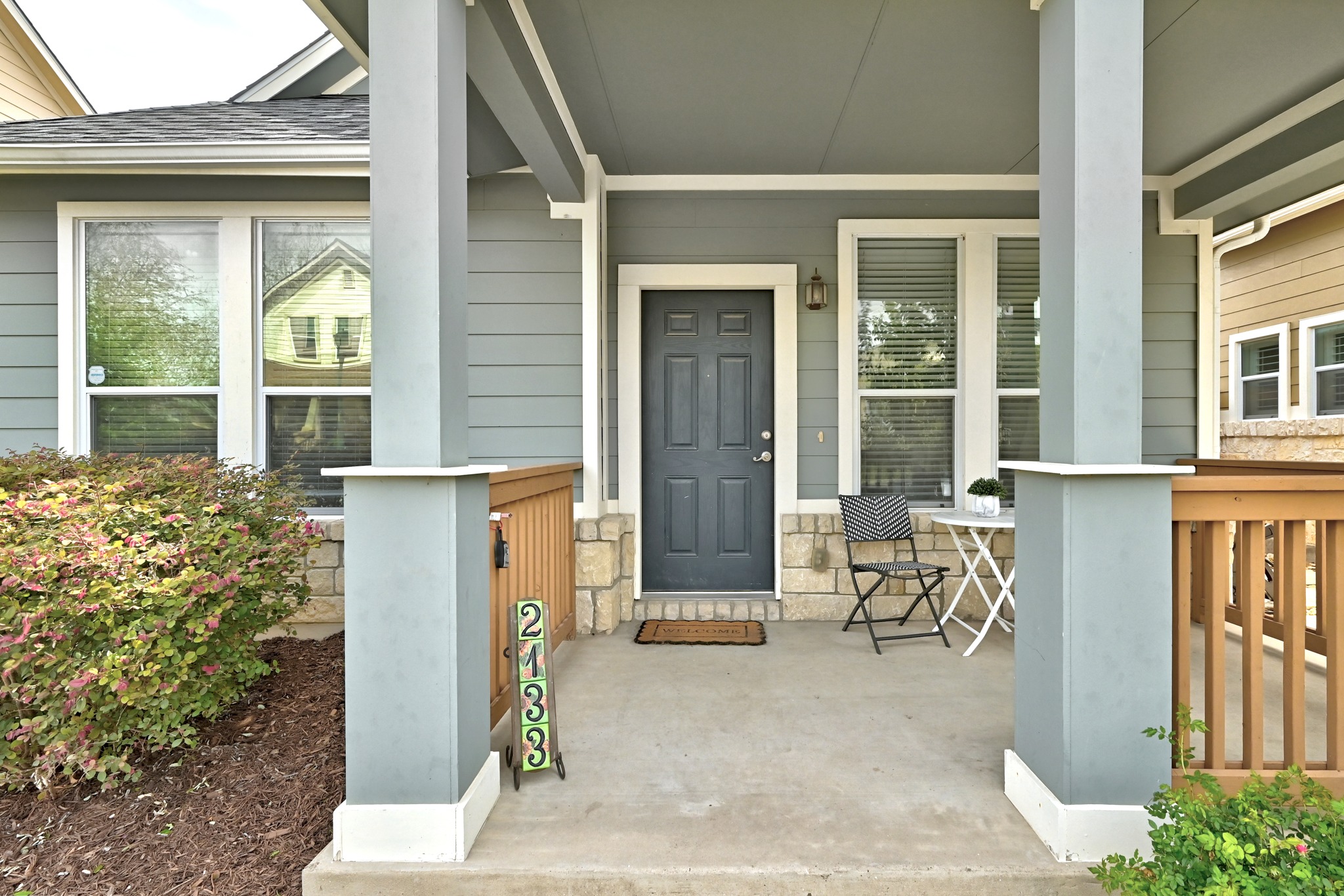 2133 Emma Long Street Austin, TX 78723 - Photo 3 of 39 A cozy front porch offers the perfect place to enjoy your morning coffee or greet neighbors.
