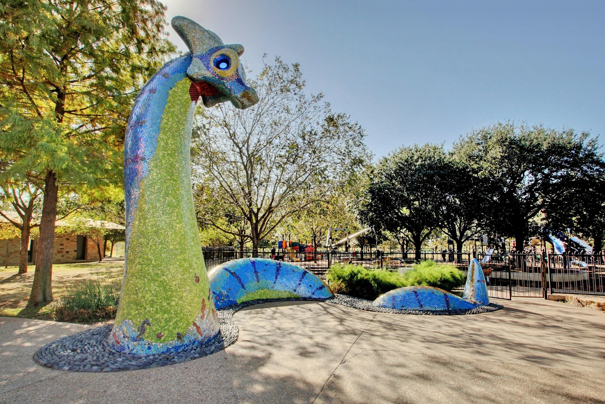 2133 Emma Long Street Austin, TX 78723 - Photo 35 of 39 Iconic dinosaur sculpture adds a playful touch to the park and is a favorite photo spot.