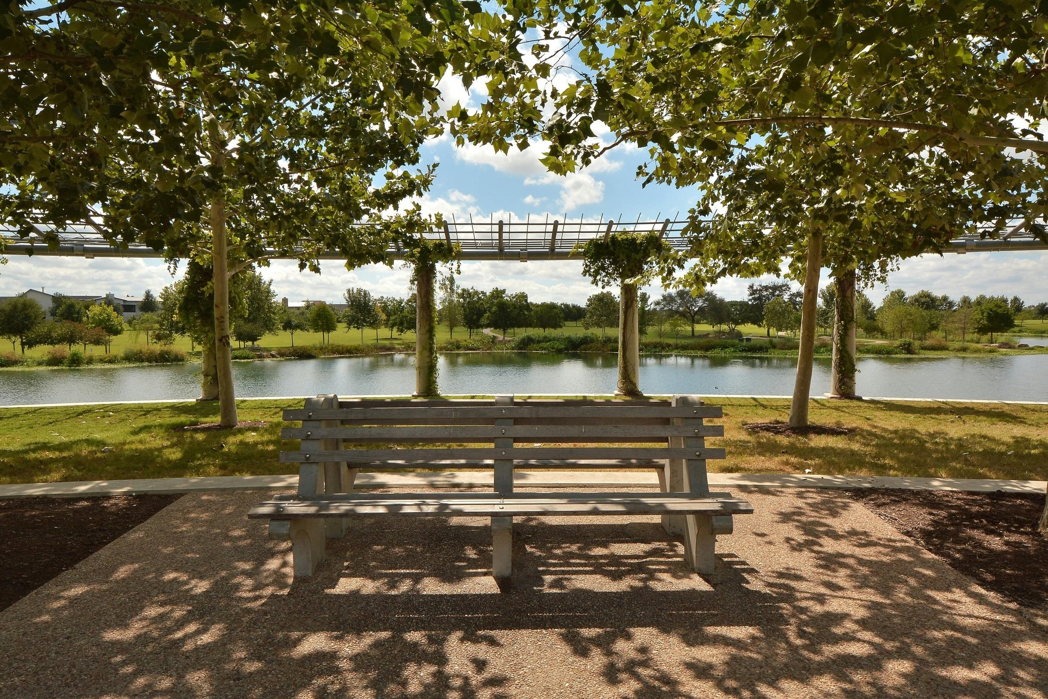 2133 Emma Long Street Austin, TX 78723 - Photo 37 of 39 Park bench overlooking the lake offers a quiet place to relax and enjoy the waterfront views. Schedule a showing today!
