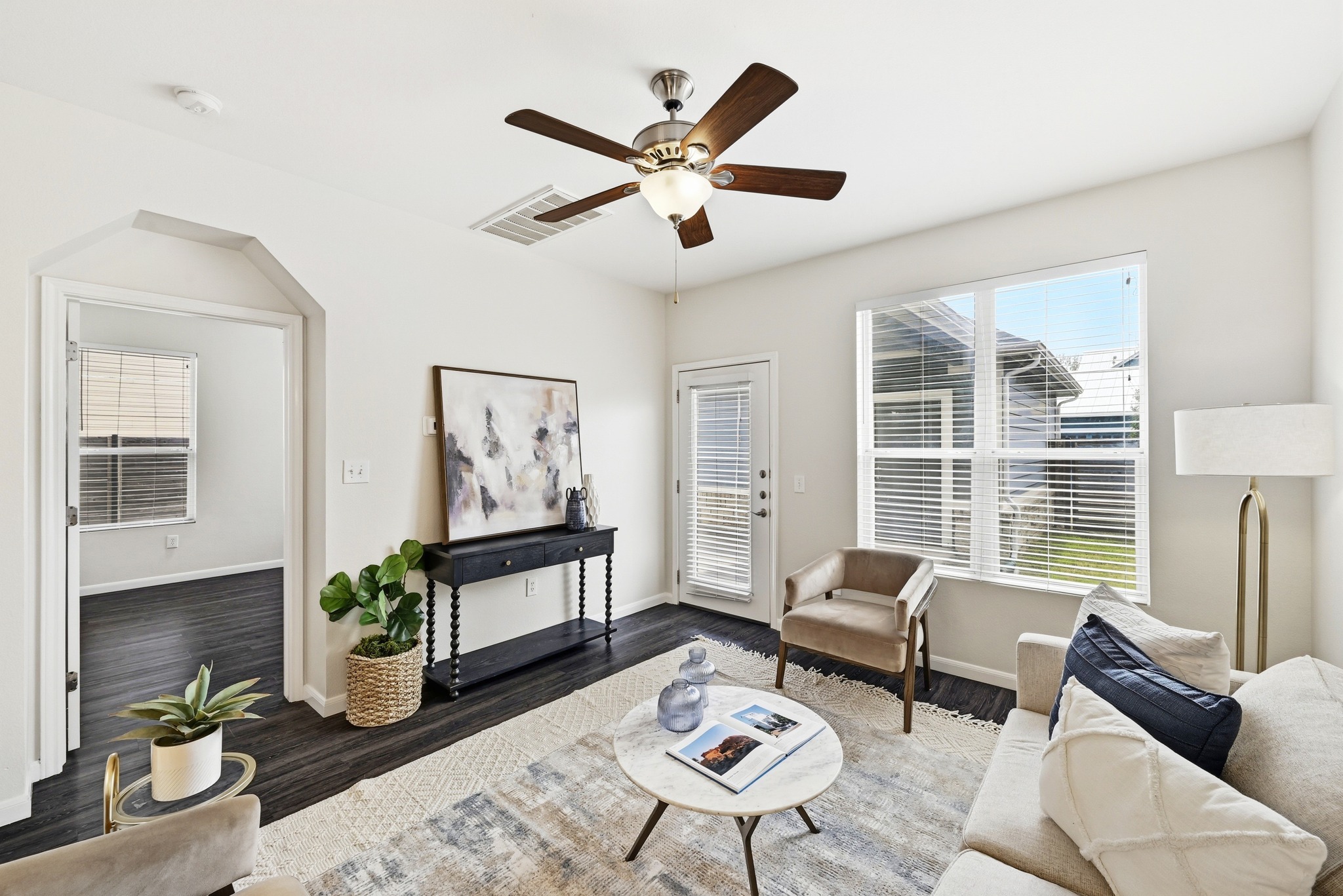 2133 Emma Long Street Austin, TX 78723 - Photo 38 of 39 The living room serves as the central hub of the home’s open floor plan.