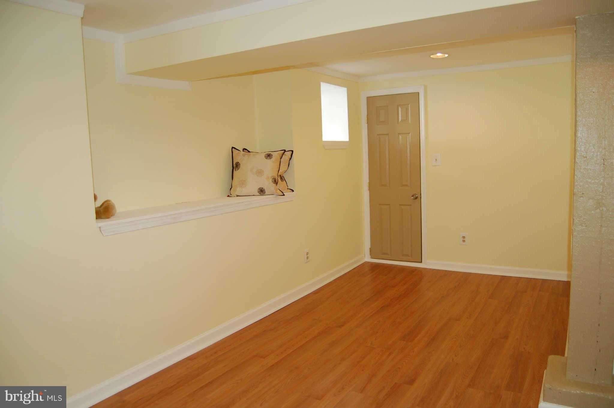 5311 Brabant Road Baltimore, MD 21229 - Photo 25 of 29 a view of small space with wooden floor