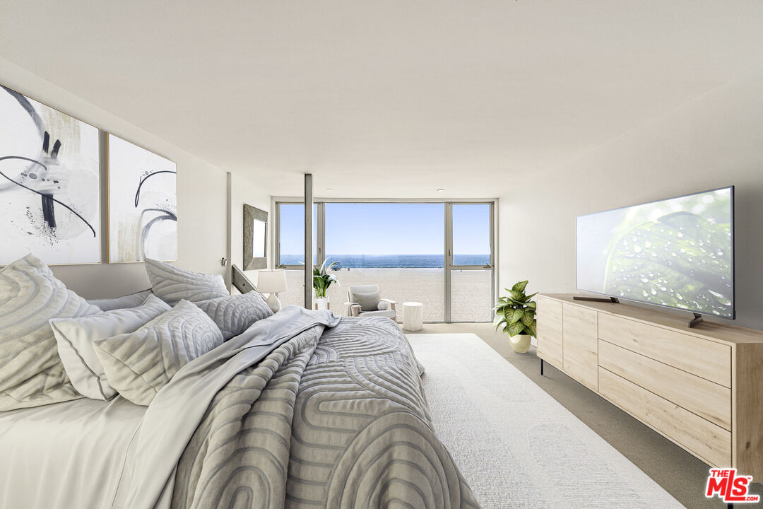 4 Jib Street, Unit 2 Marina del Rey, CA 90292 - Photo 21 of 37 a bedroom with a large bed and a flat screen tv