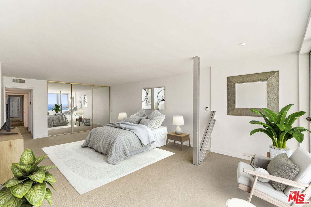 4 Jib Street, Unit 2 Marina del Rey, CA 90292 - Photo 22 of 37 a bedroom with furniture and a potted plant