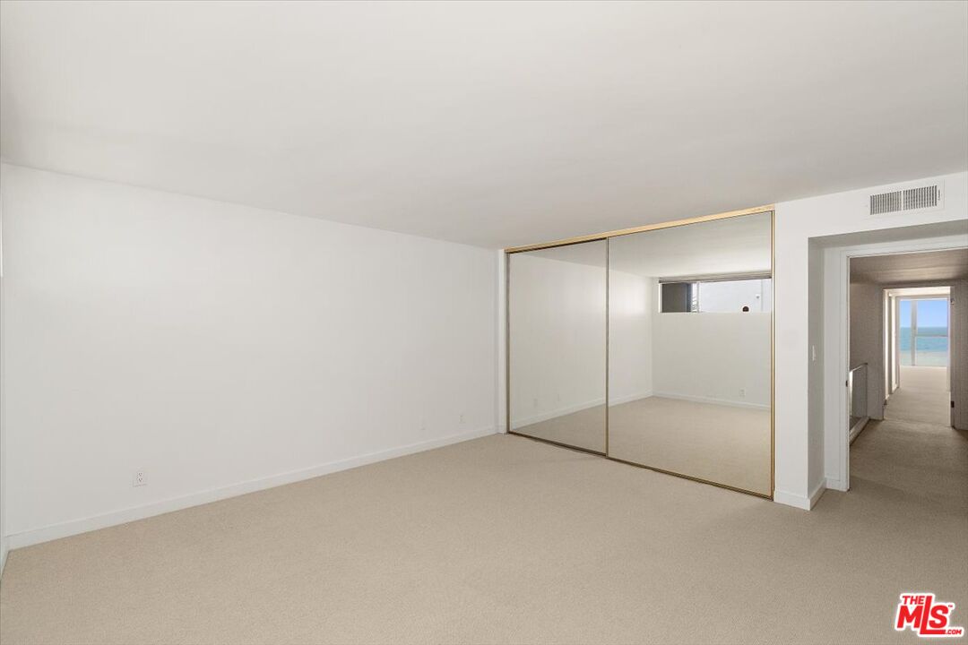 4 Jib Street, Unit 2 Marina del Rey, CA 90292 - Photo 31 of 37 an empty room with sliding glass door