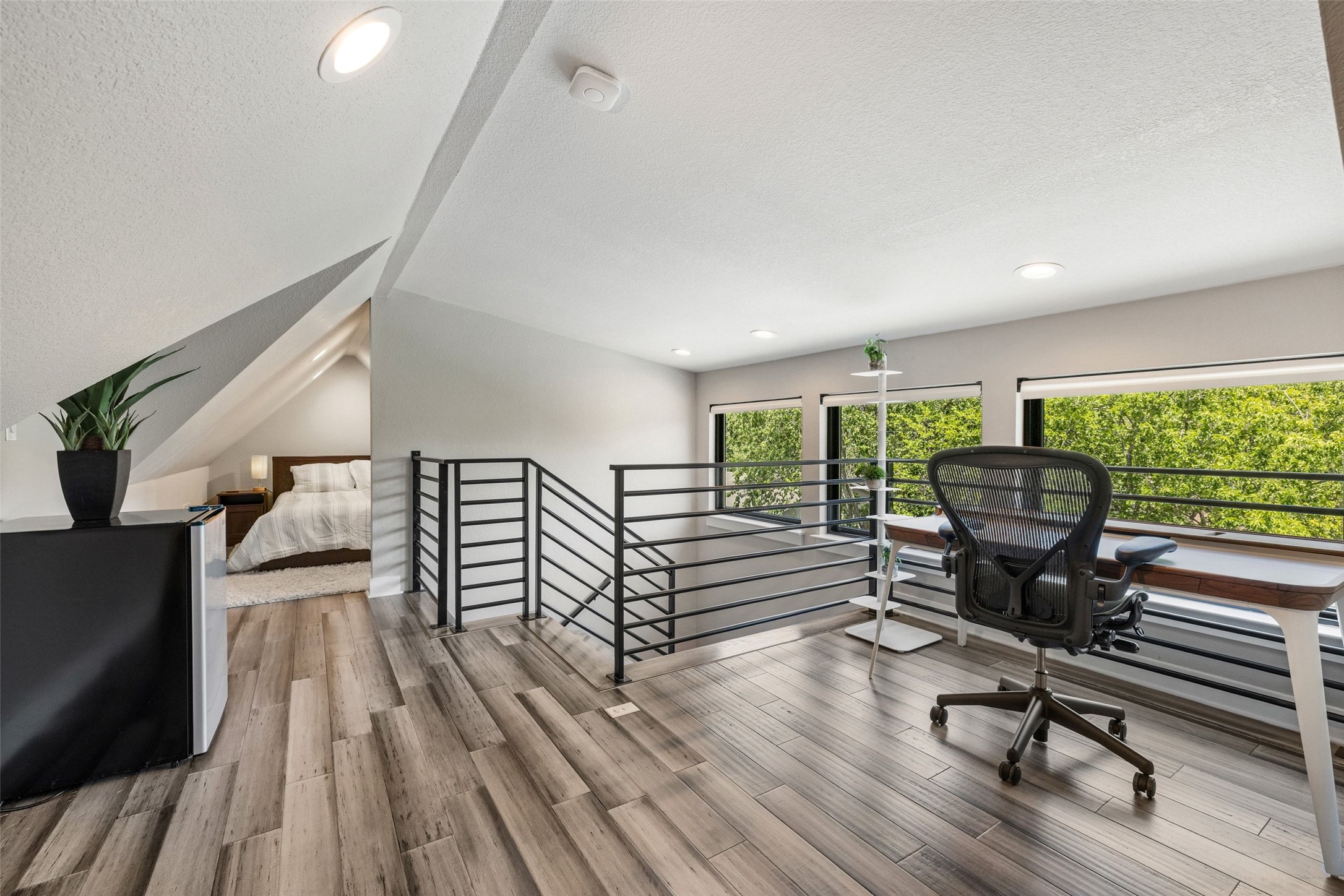 2202 Santa Rita Street Austin, TX 78702 - Photo 25 of 40 On the 3rd floor, there is a private loft space with enough room for a bed, couch, and WFH set up