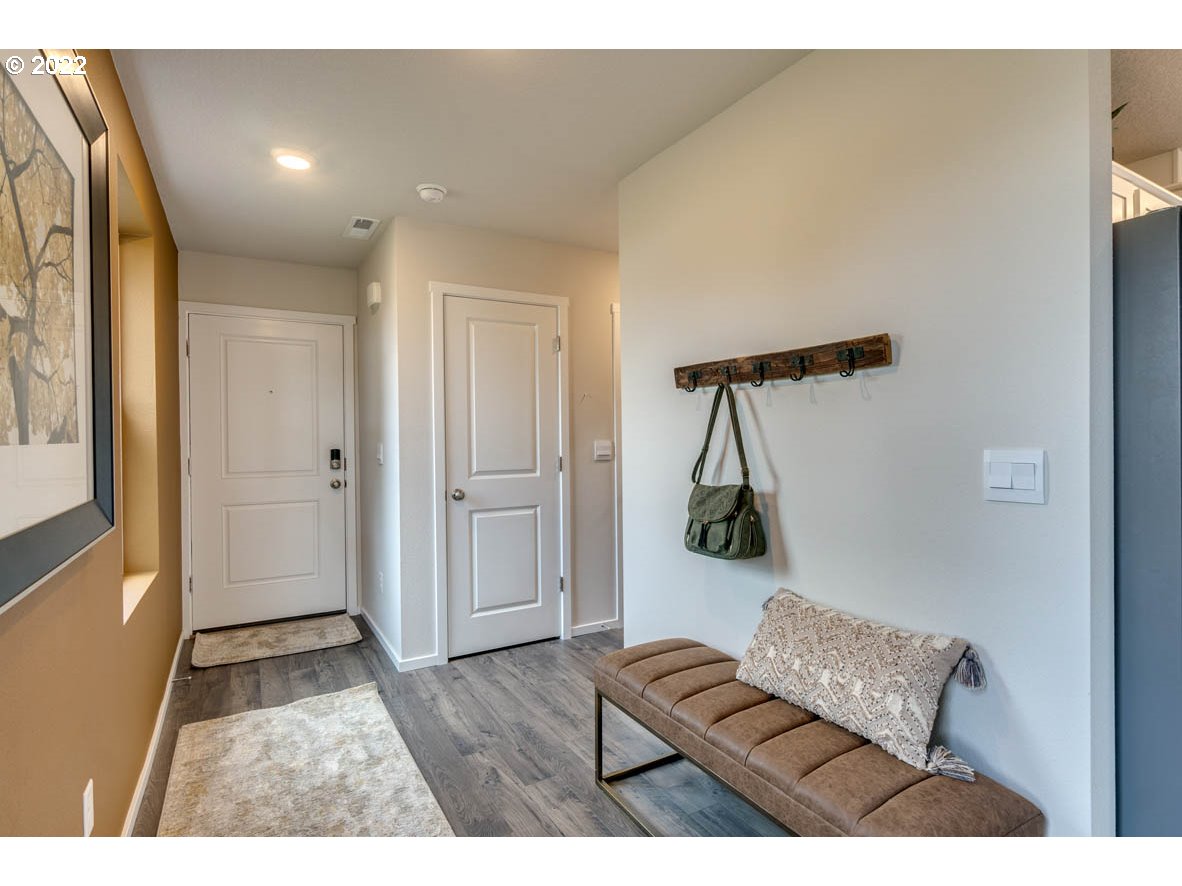 228 North 30th Drive Ridgefield, WA 98642 - Photo 3 of 24 a living room with furniture and a window