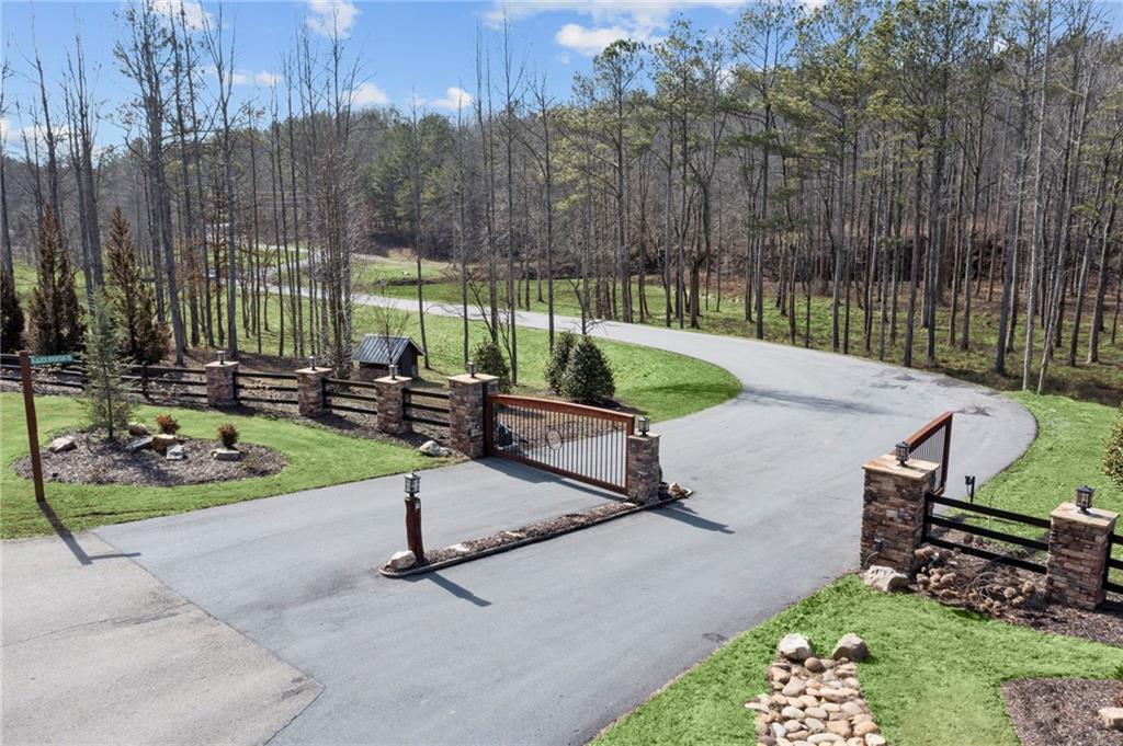 Lot 04 Blalock Mountain Road Talking Rock, GA 30175 - Photo 13 of 18 a park with bench and trees