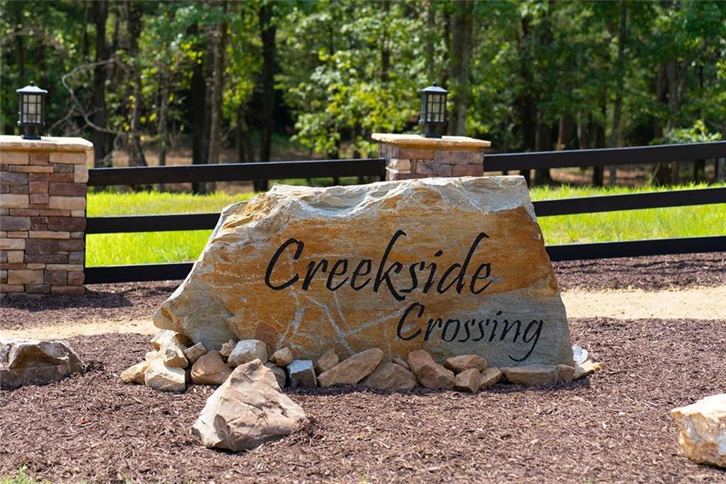 Lot 04 Blalock Mountain Road Talking Rock, GA 30175 - Photo 9 of 18 a sign that is sitting on the ground