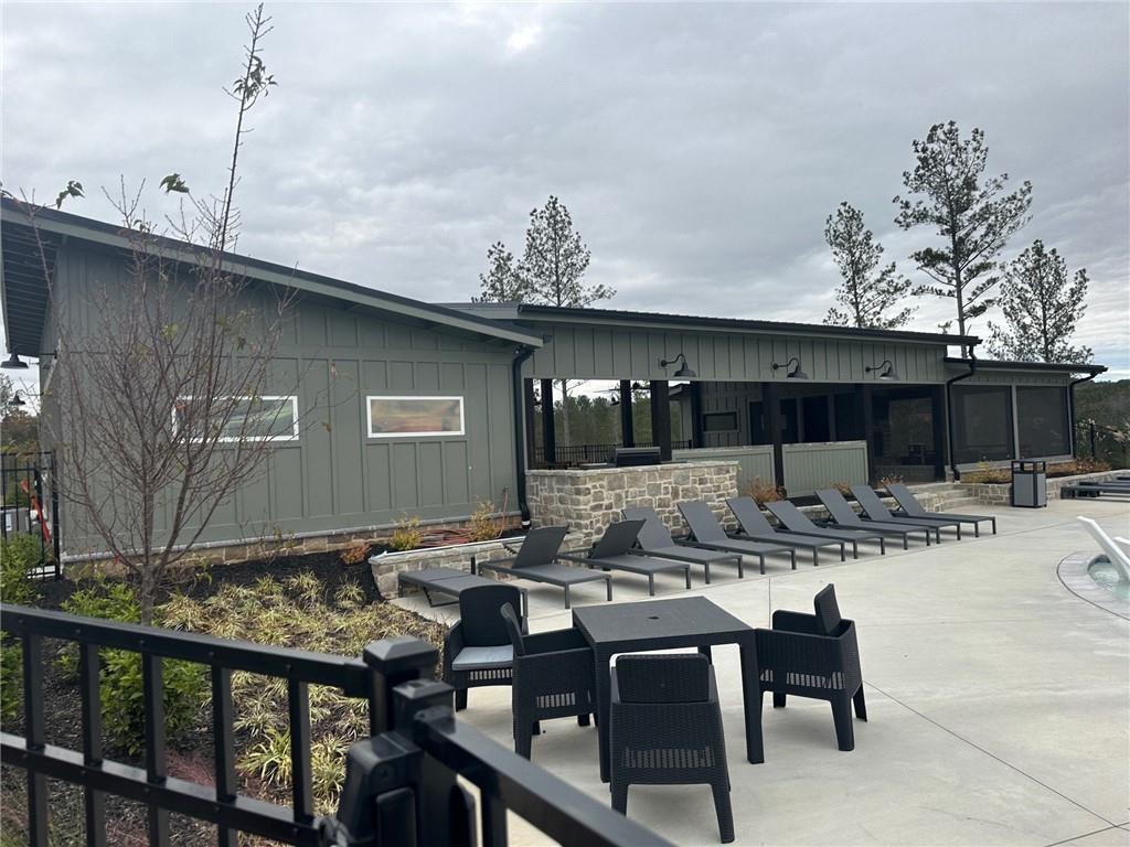 Lot 04 Blalock Mountain Road Talking Rock, GA 30175 - Photo 10 of 18 a view of a house with backyard and sitting area