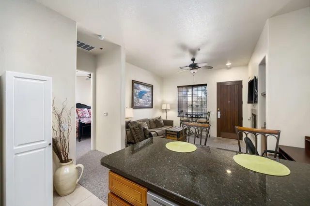 a living room with furniture and a table