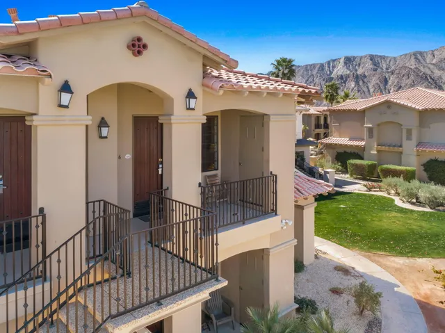 a front view of house with yard outdoor seating and barbeque oven